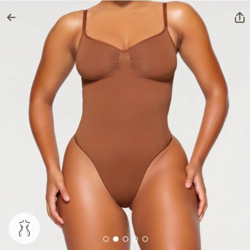 Skims Seamless Sculpting Thong Bodysuit in Bronze